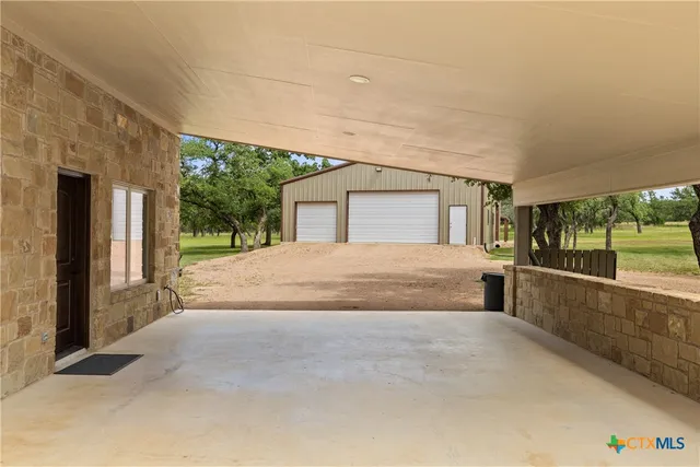 a spacious bathroom with a bathtub and shower