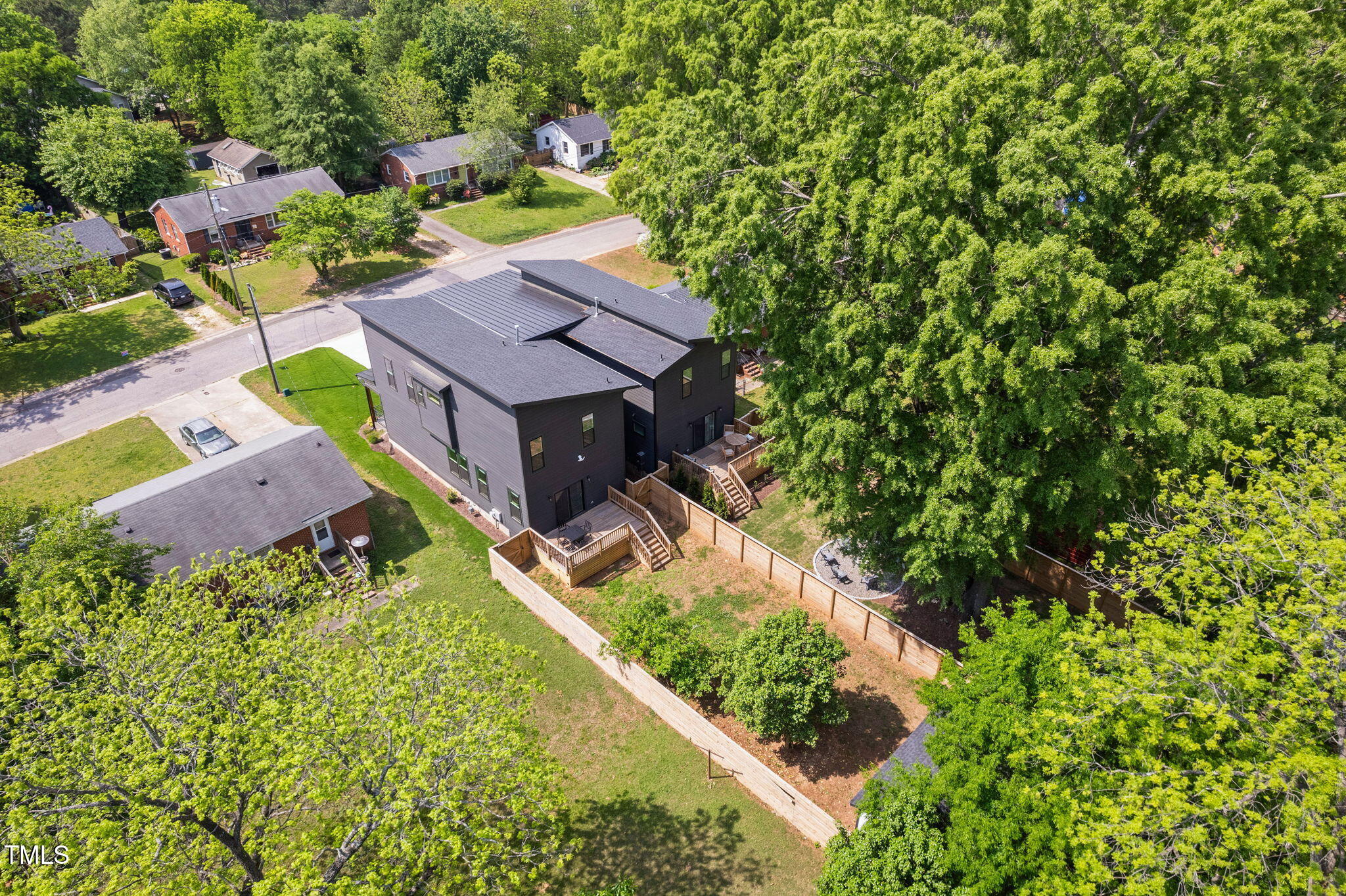 2325 Sheffield Road, Unit 102 Raleigh, NC 27610 - Photo 32 of 38 an aerial view of a house with a yard basket ball court and outdoor seating