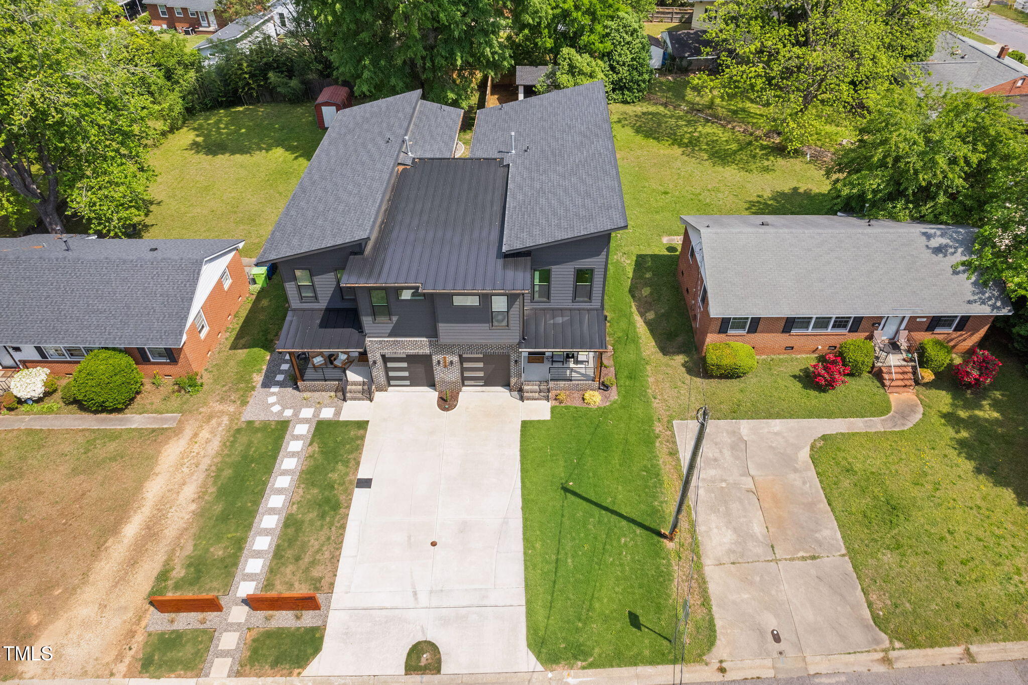 2325 Sheffield Road, Unit 102 Raleigh, NC 27610 - Photo 34 of 38 an aerial view of a house with swimming pool garden and patio