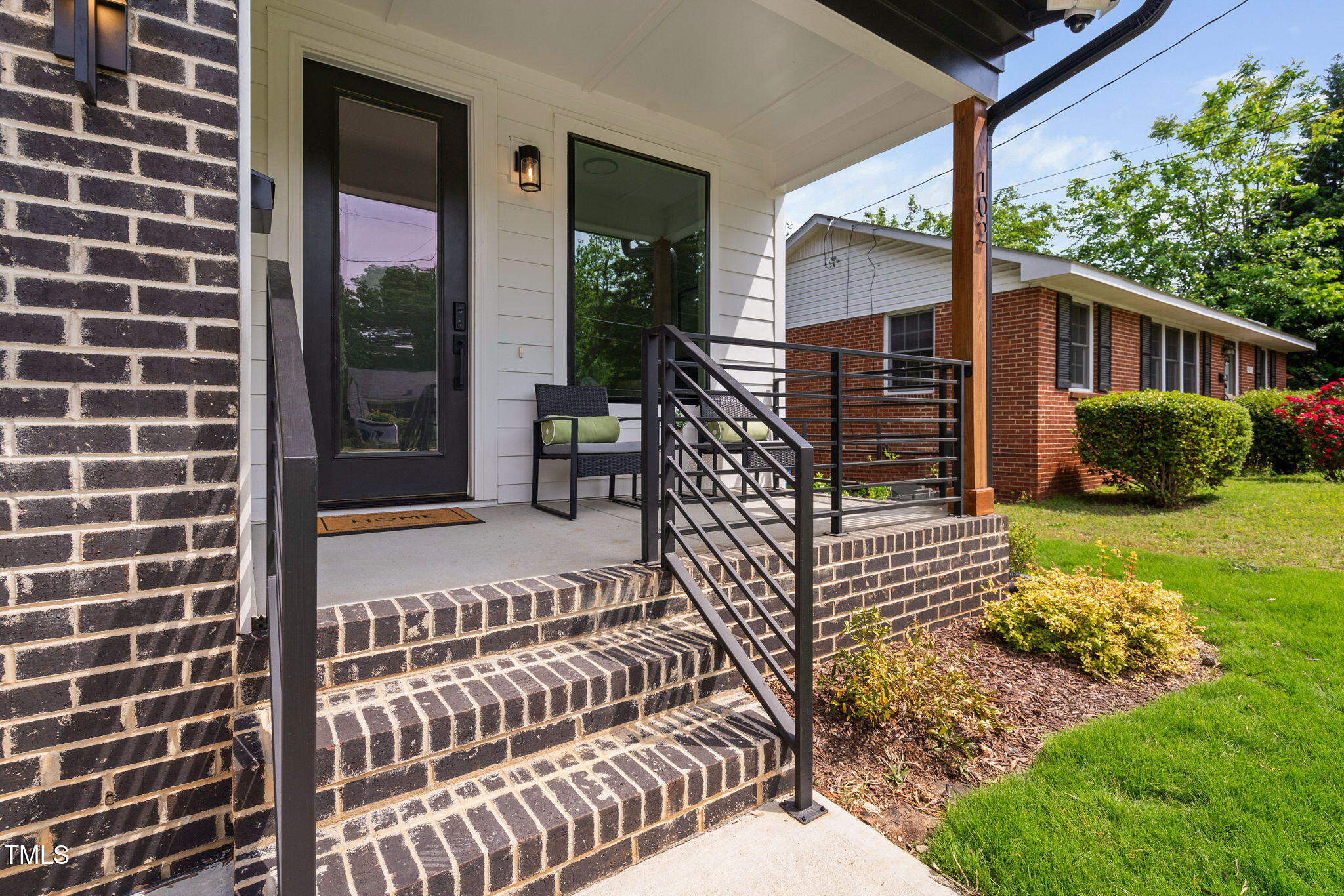 2325 Sheffield Road, Unit 102 Raleigh, NC 27610 - Photo 6 of 38 a view of a house with a yard