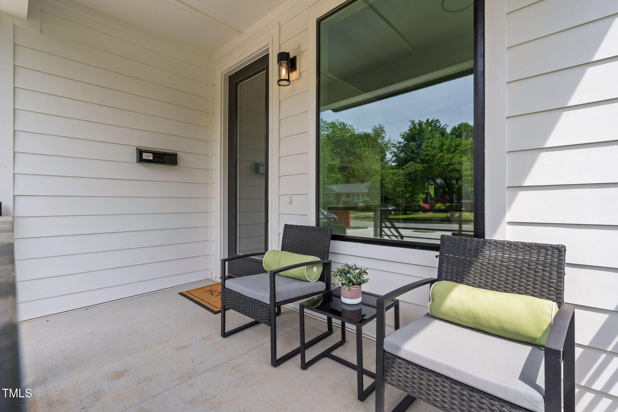 2325 Sheffield Road, Unit 102 Raleigh, NC 27610 - Photo 7 of 38 a view of an outdoor sitting area with furniture