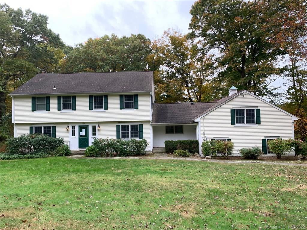 156 Colonial Road New Canaan, CT 06840 - Photo 1 of 1 a view of a yard in front of house