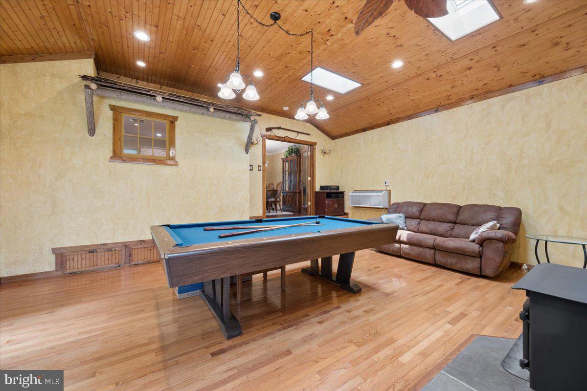 19829 Spurrier Avenue Poolesville, MD 20837 - Photo 16 of 72 Spacious game room with rustic charm.