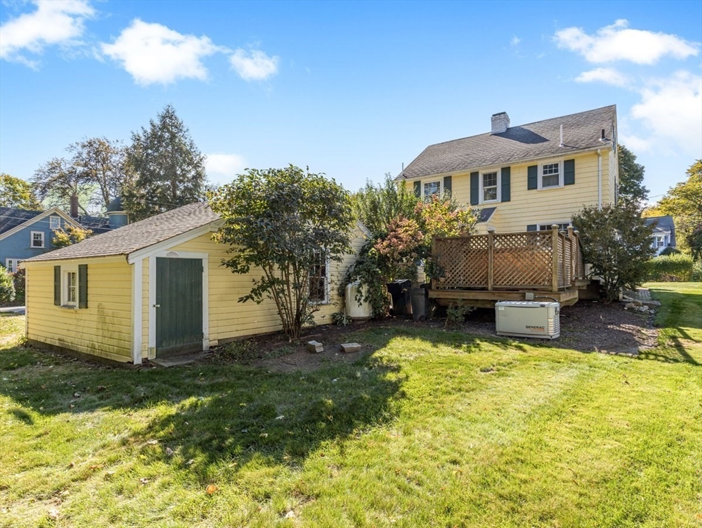 14 Cottage Street Sharon, MA 02067 - Photo 4 of 27 a yellow house with swimming pool in front of it