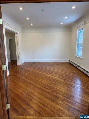 a view of a bathroom from the hallway
