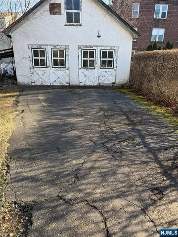 a view of a large yard with an outdoor space