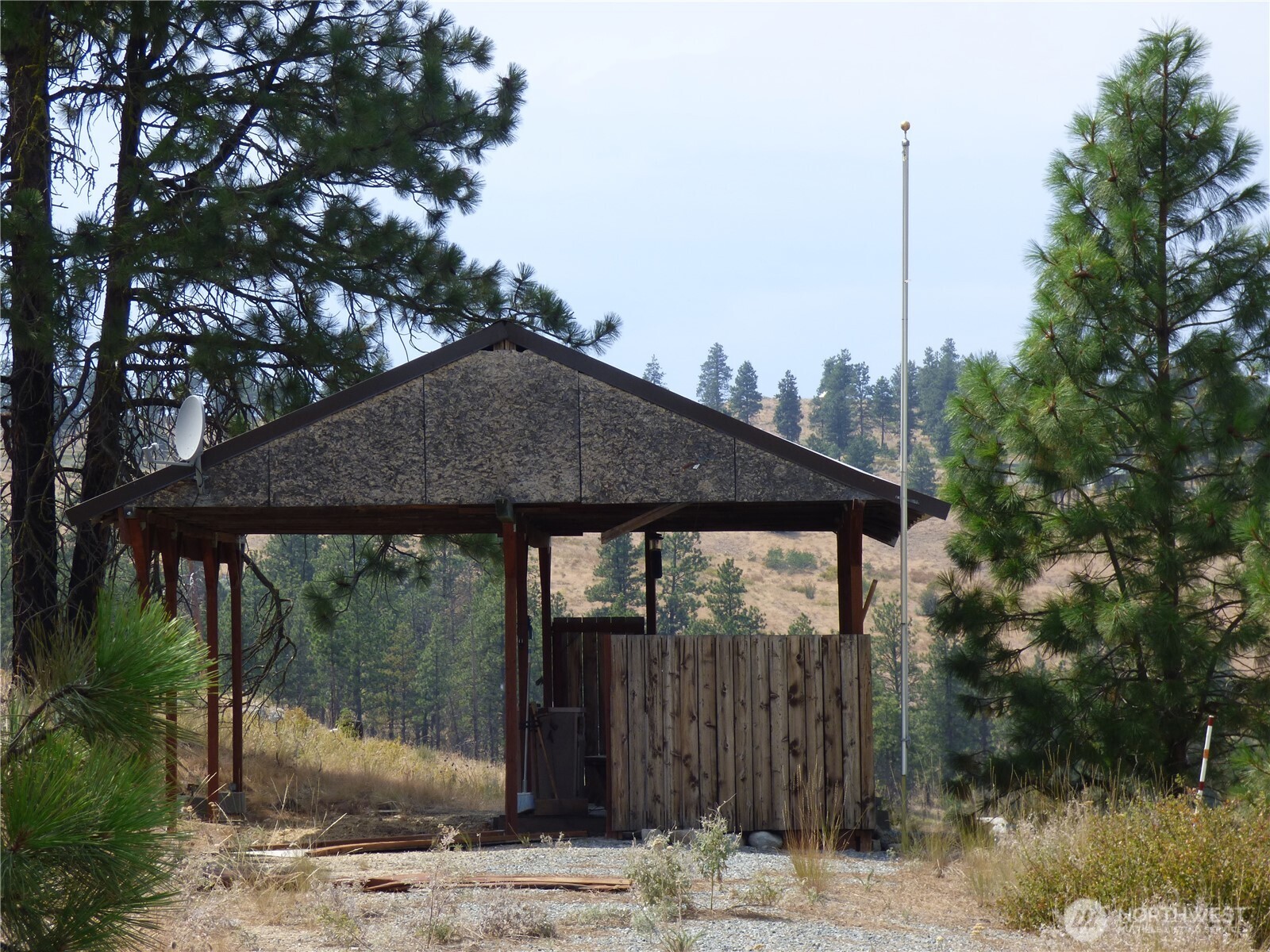 0 Mountain Point Road Brewster, WA 98812 - Photo 3 of 11 a backyard of a house with barbeque oven