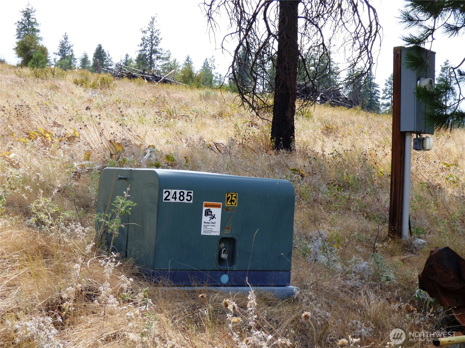 0 Mountain Point Road Brewster, WA 98812 - Photo 8 of 11 a sign board on the side of a road