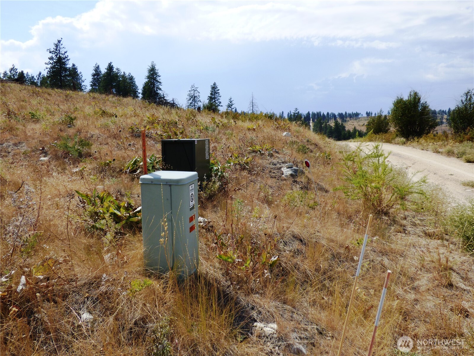 0 Mountain Point Road Brewster, WA 98812 - Photo 9 of 11 a view of a lake with a city