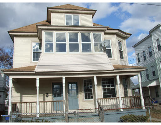42 Berkshire Street Springfield, MA 01151 - Photo 1 of 1 a front view of a house with a porch