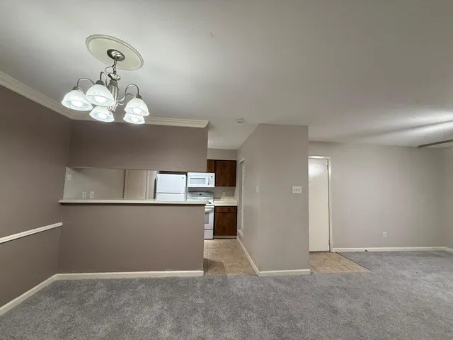 a view of a kitchen with a sink
