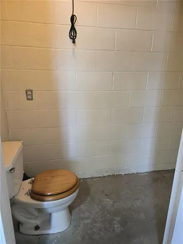 a view of a room with wooden walls