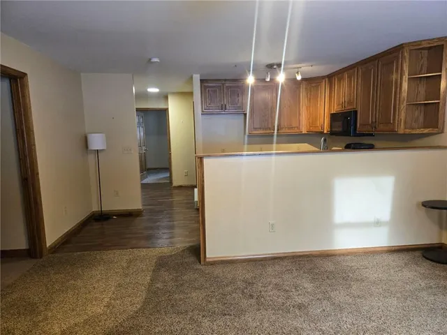 a view of a kitchen with a sink