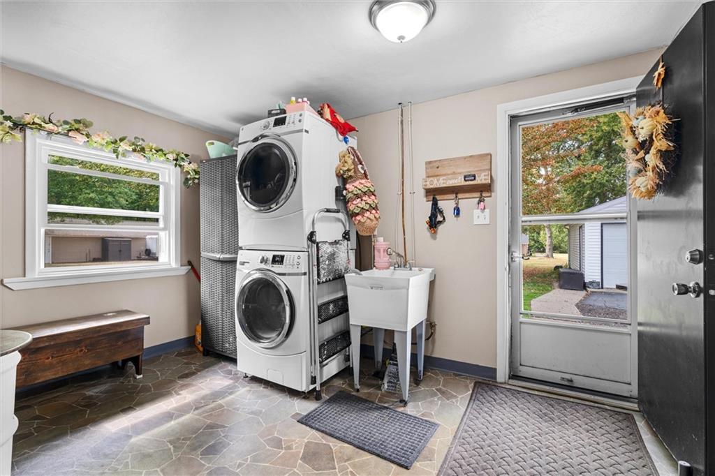 56 Concord Road Hermitage, PA 16148 - Photo 13 of 23 a utility room with sink dryer and washer