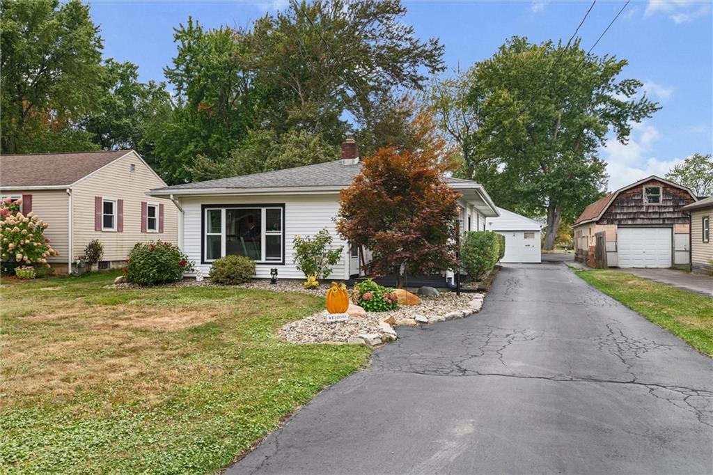 56 Concord Road Hermitage, PA 16148 - Photo 15 of 23 a view of a house with backyard and garden