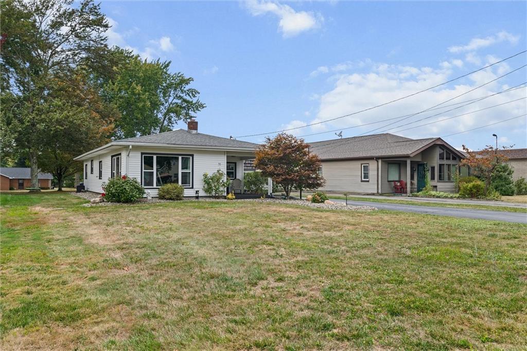 56 Concord Road Hermitage, PA 16148 - Photo 16 of 23 a front view of a house with a garden