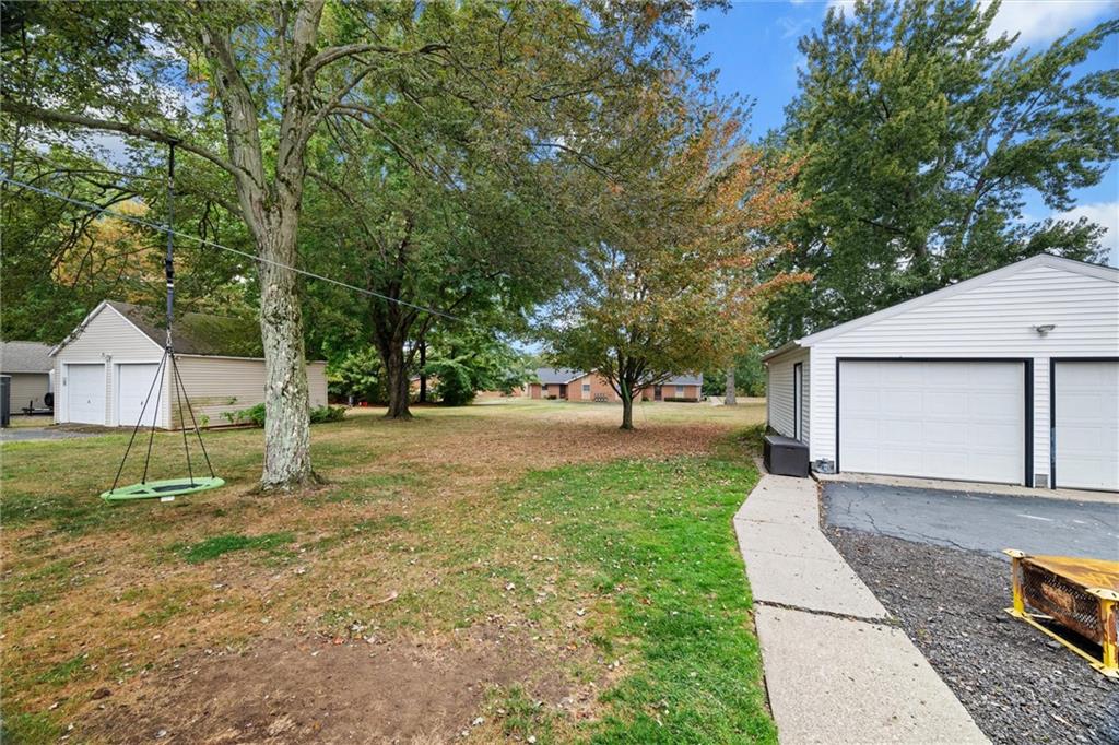 56 Concord Road Hermitage, PA 16148 - Photo 19 of 23 a view of a yard with large tree