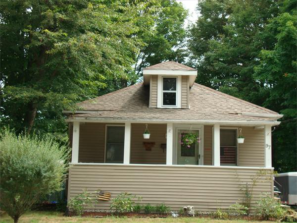 97 Denver Street Springfield, MA 01109 - Photo 1 of 1 a front view of a house with a yard