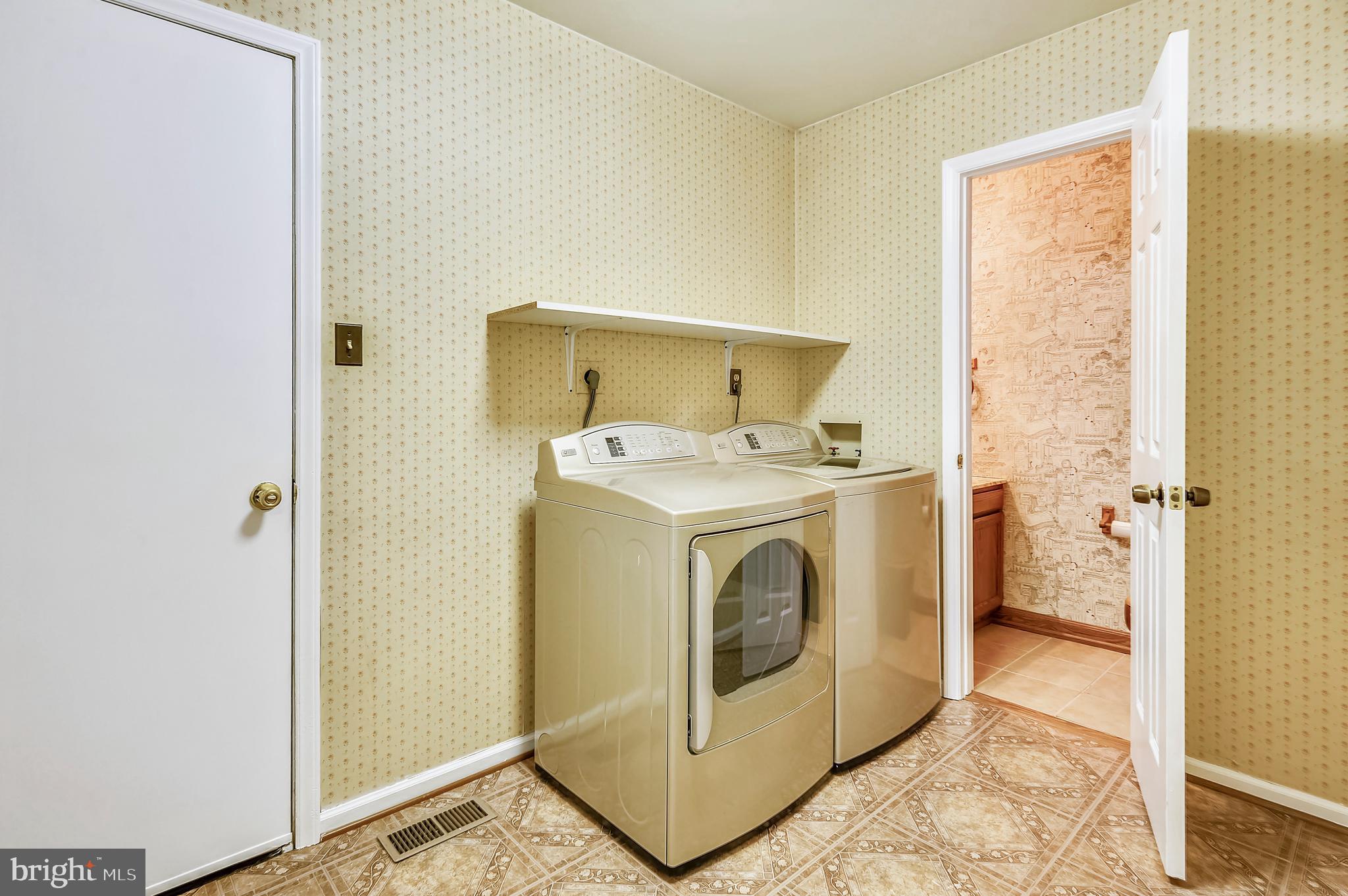 6514 Wilson Road Friendship, MD 20758 - Photo 28 of 38 Laundry/Mud room between Garage & Kitchen w/Powder
