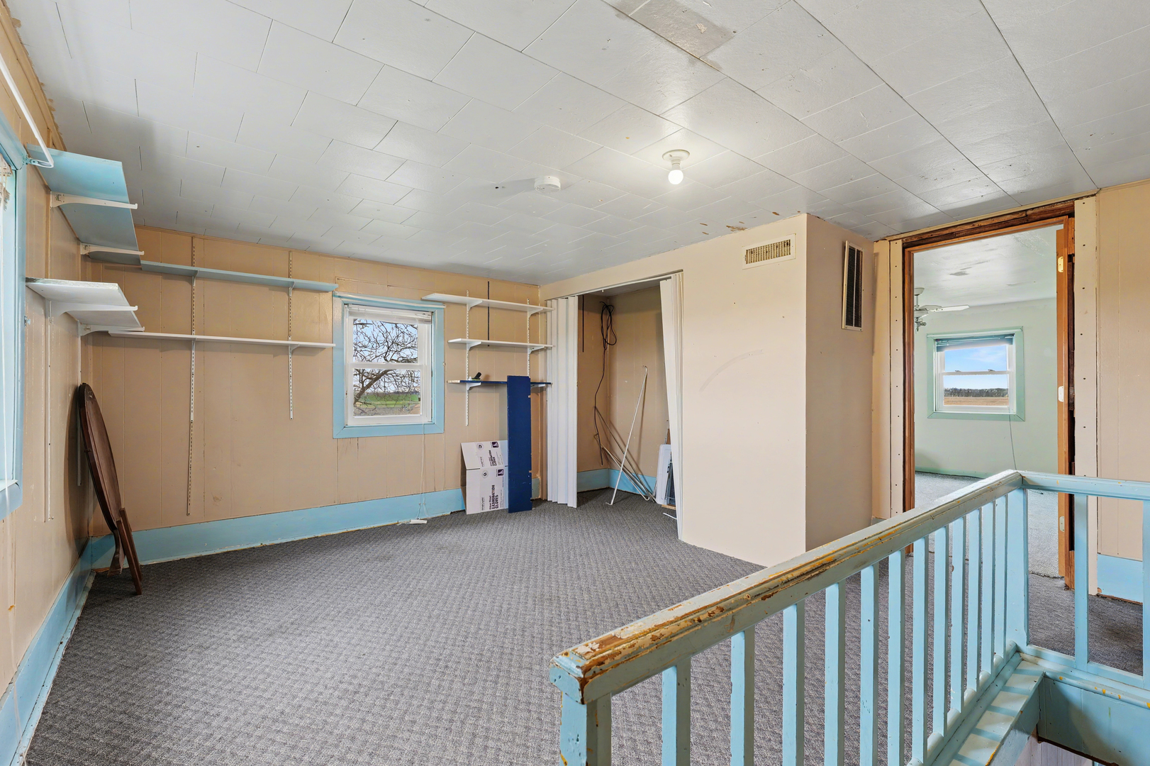 724 East 2600 North Road Penfield, IL 61862 - Photo 27 of 43 a view of an empty room with a window