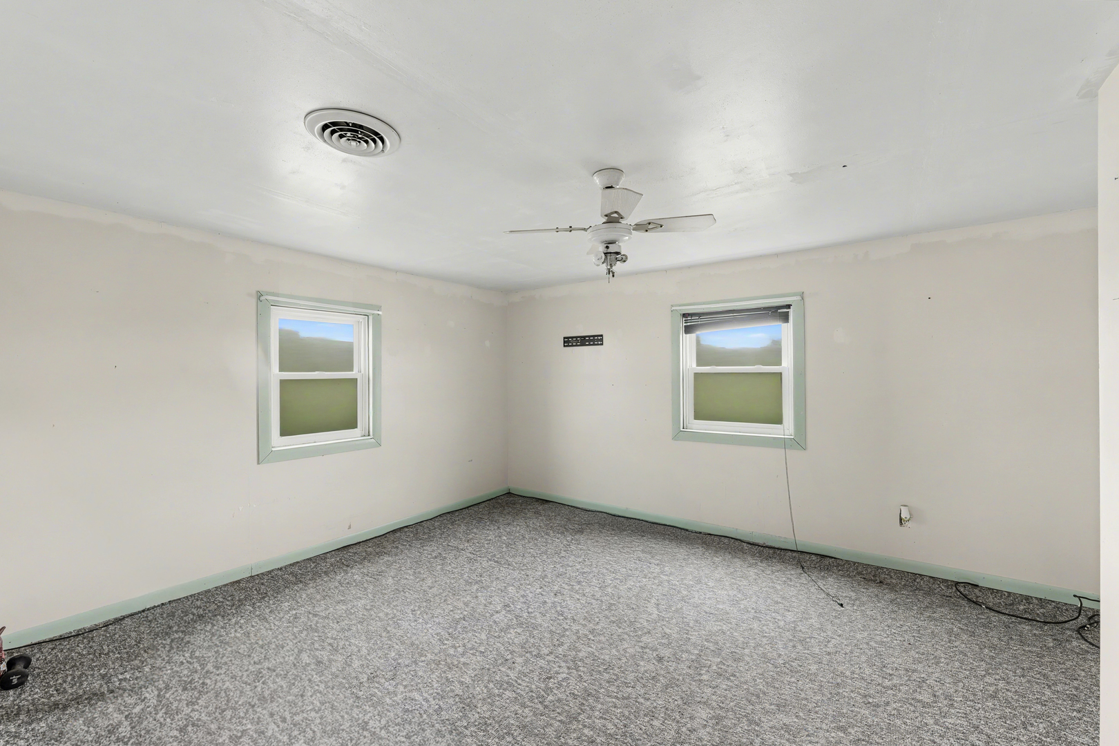 724 East 2600 North Road Penfield, IL 61862 - Photo 29 of 43 an empty room with a window