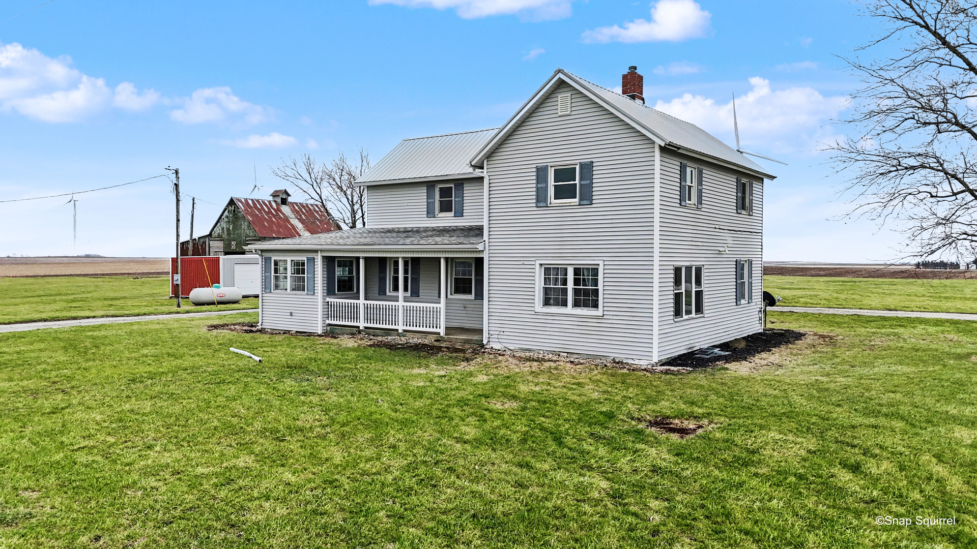 724 East 2600 North Road Penfield, IL 61862 - Photo 3 of 43 a view of a house with a yard
