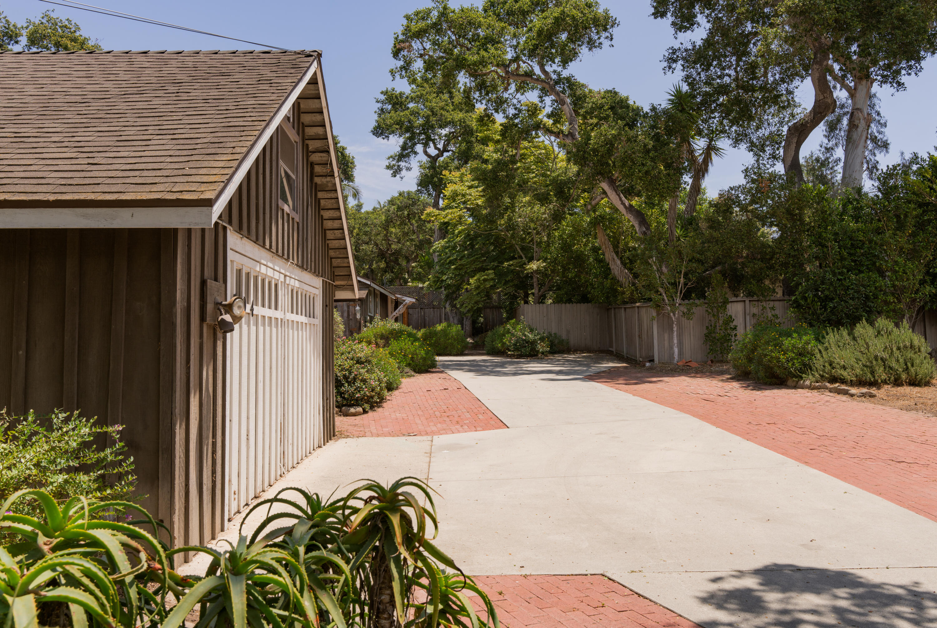504 Hodges Lane Montecito, CA 93108 - Photo 3 of 14 a view of a backyard with potted plants