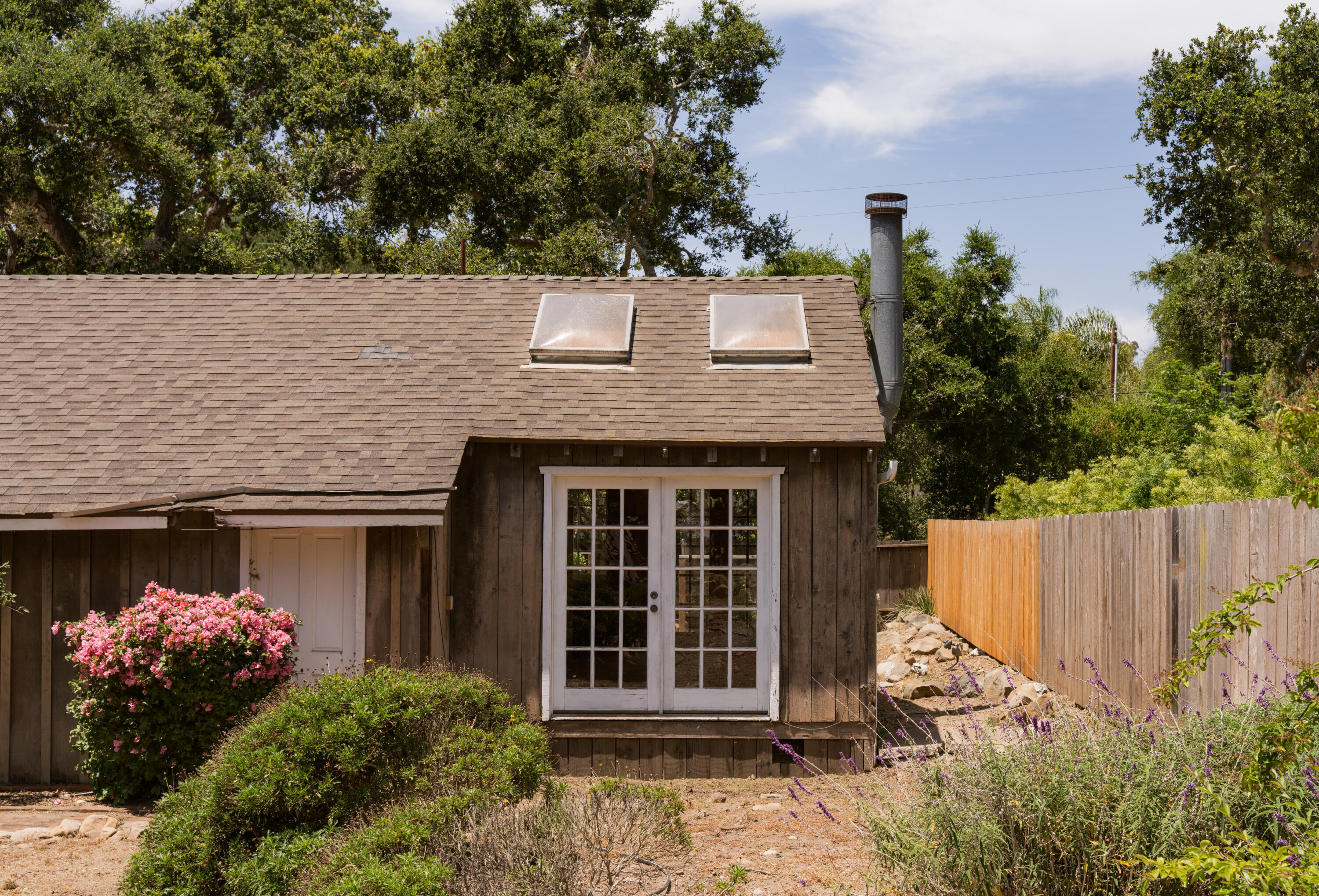 504 Hodges Lane Montecito, CA 93108 - Photo 8 of 14 a front view of a house with garden