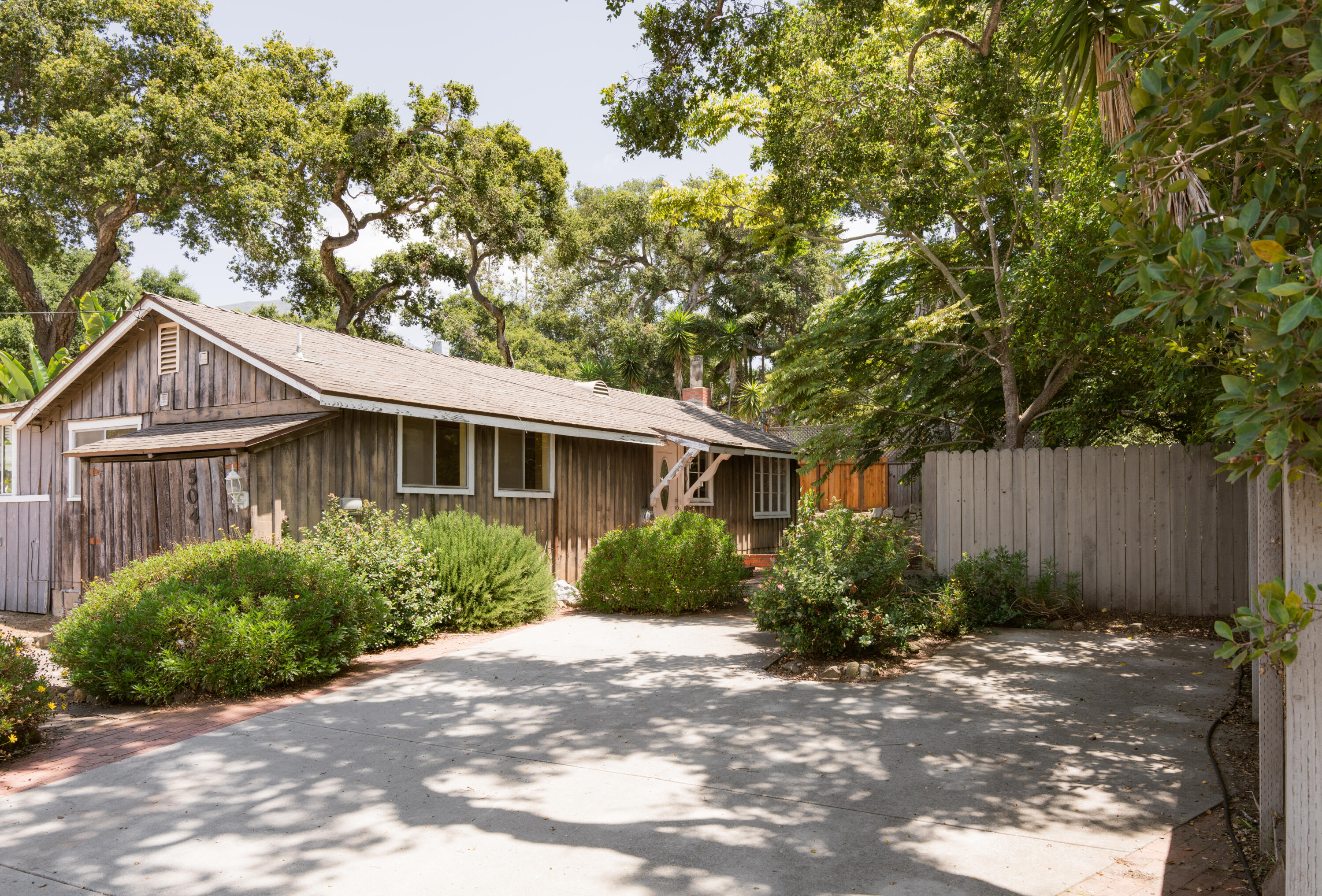 504 Hodges Lane Montecito, CA 93108 - Photo 10 of 14 a front view of a house with garden
