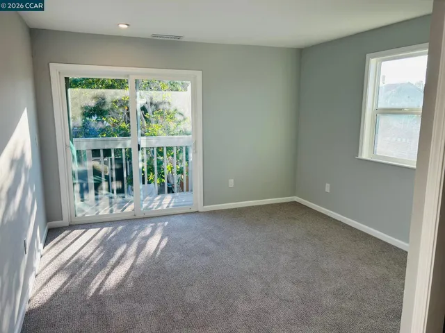 a bathroom with a toilet a sink and shower