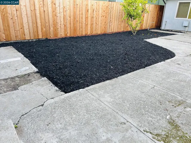 a view of a hallway with washer and dryer