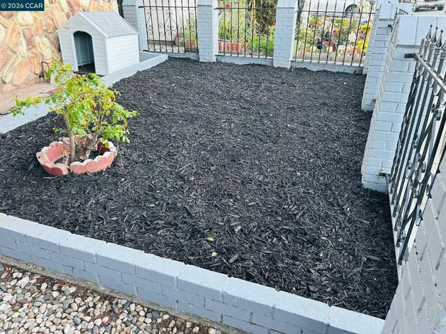 a kitchen with stainless steel appliances a refrigerator and a stove