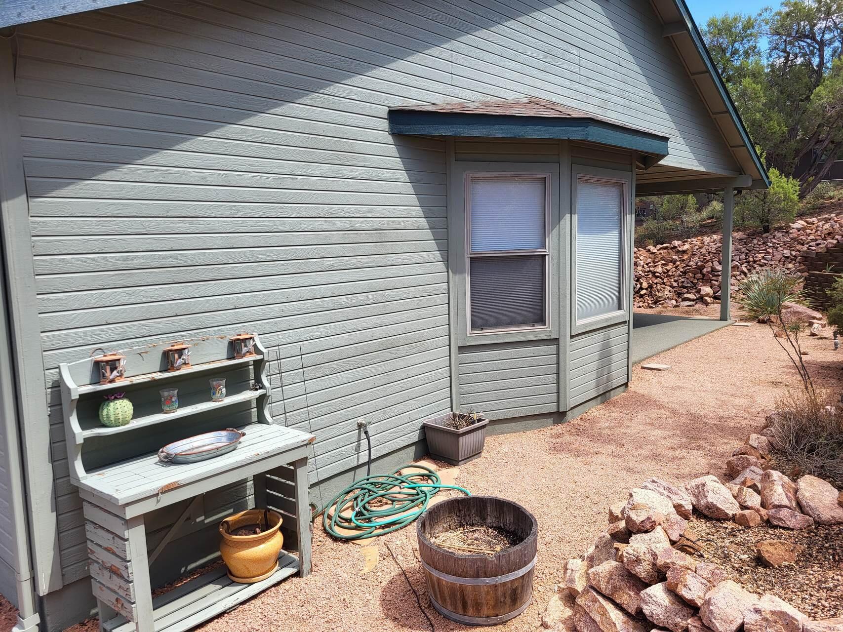 1120 South Sycamore Circle Payson, AZ 85541 - Photo 39 of 44 a backyard of a house with fire pit and outdoor seating