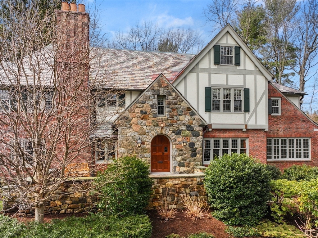 91 Hundreds Road Wellesley, MA 02481 - Photo 1 of 42 front view of a house with a yard