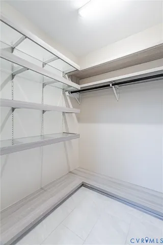 a view of an empty walk in closet