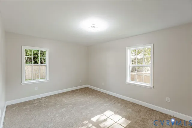 a view of an empty room and window