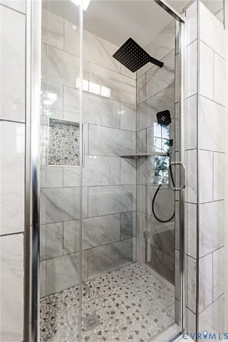 a kitchen with a sink a refrigerator and a stove