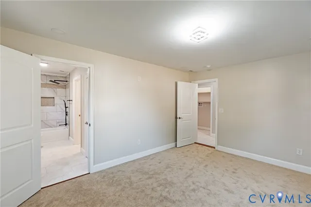 an empty room with closet area