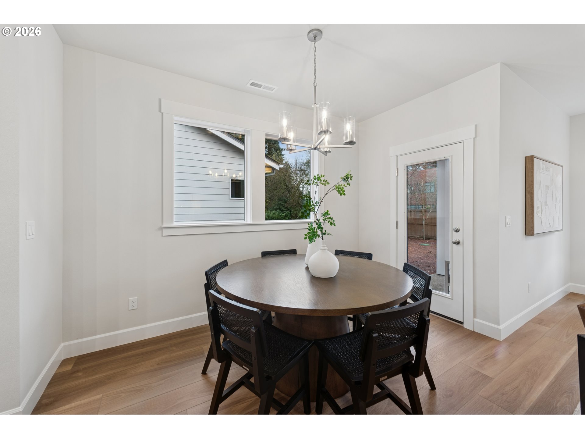 16546 Southwest Deer Terrace Durham, OR 97224 - Photo 15 of 26 a dining room with wooden table and chairs