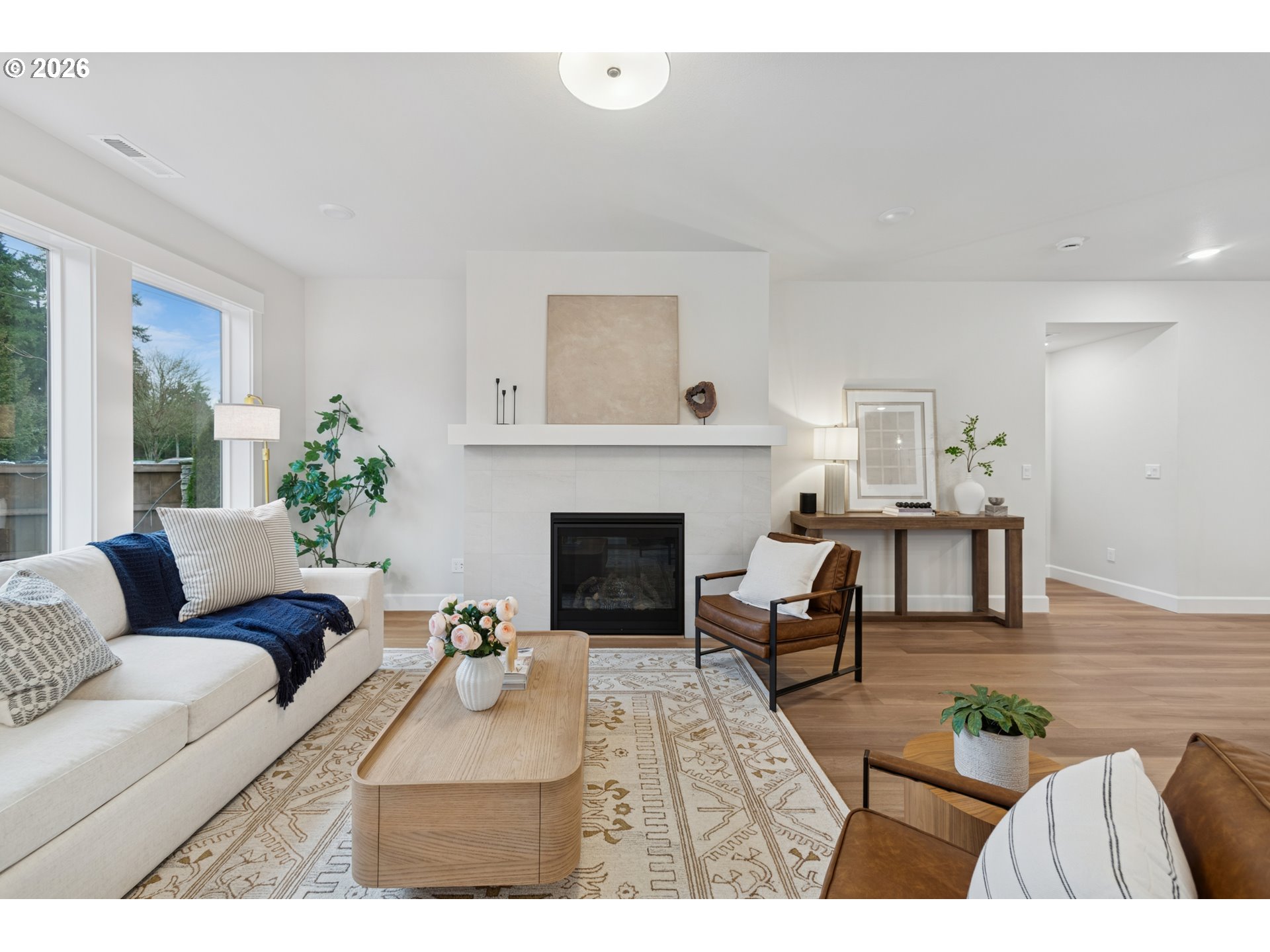 16546 Southwest Deer Terrace Durham, OR 97224 - Photo 18 of 26 a living room with furniture and a fireplace