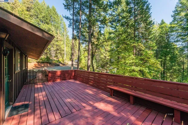 a view of balcony with wooden floor