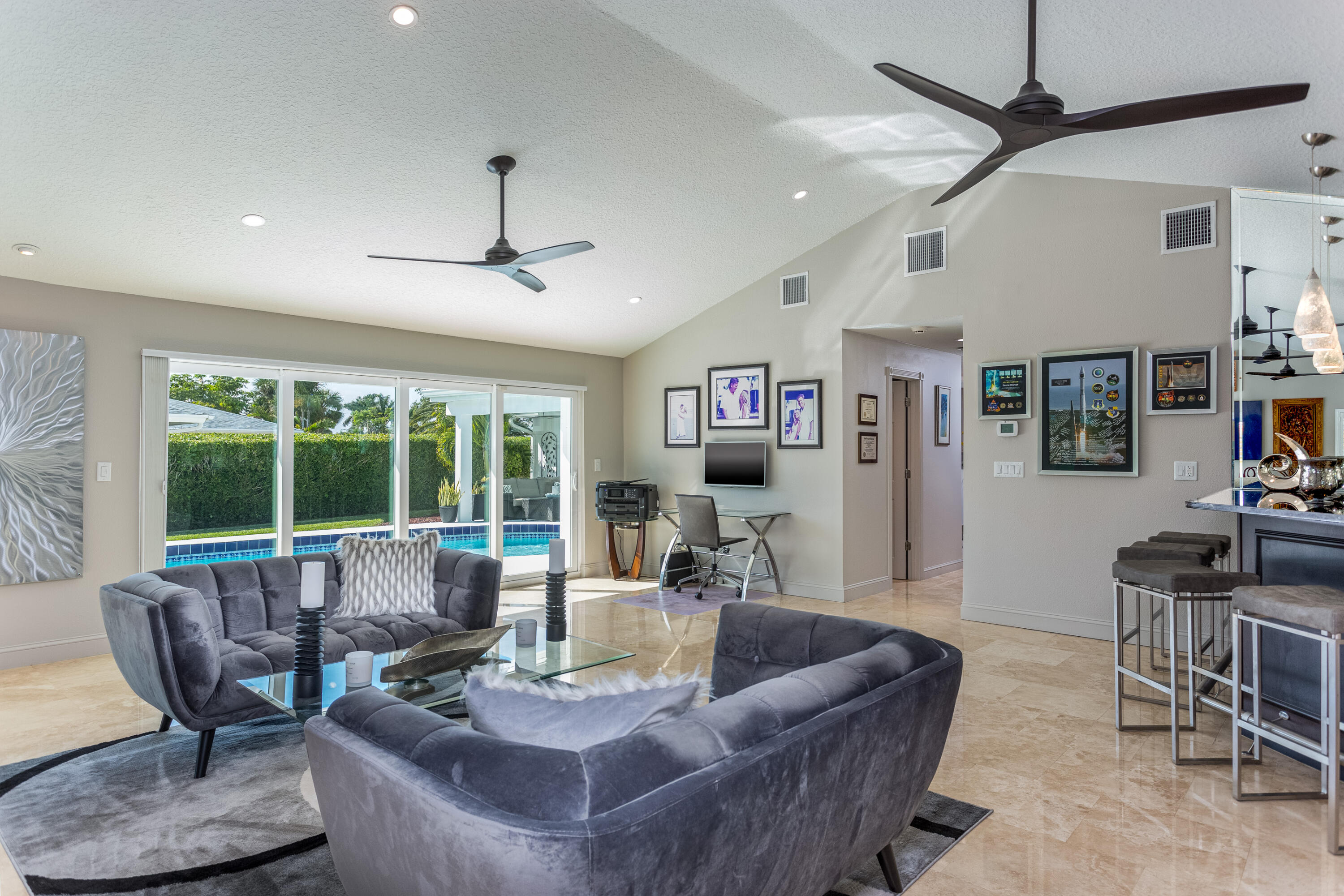 4 Country Club Road Cocoa Beach, FL 32931 - Photo 16 of 38 a living room with furniture and a large window