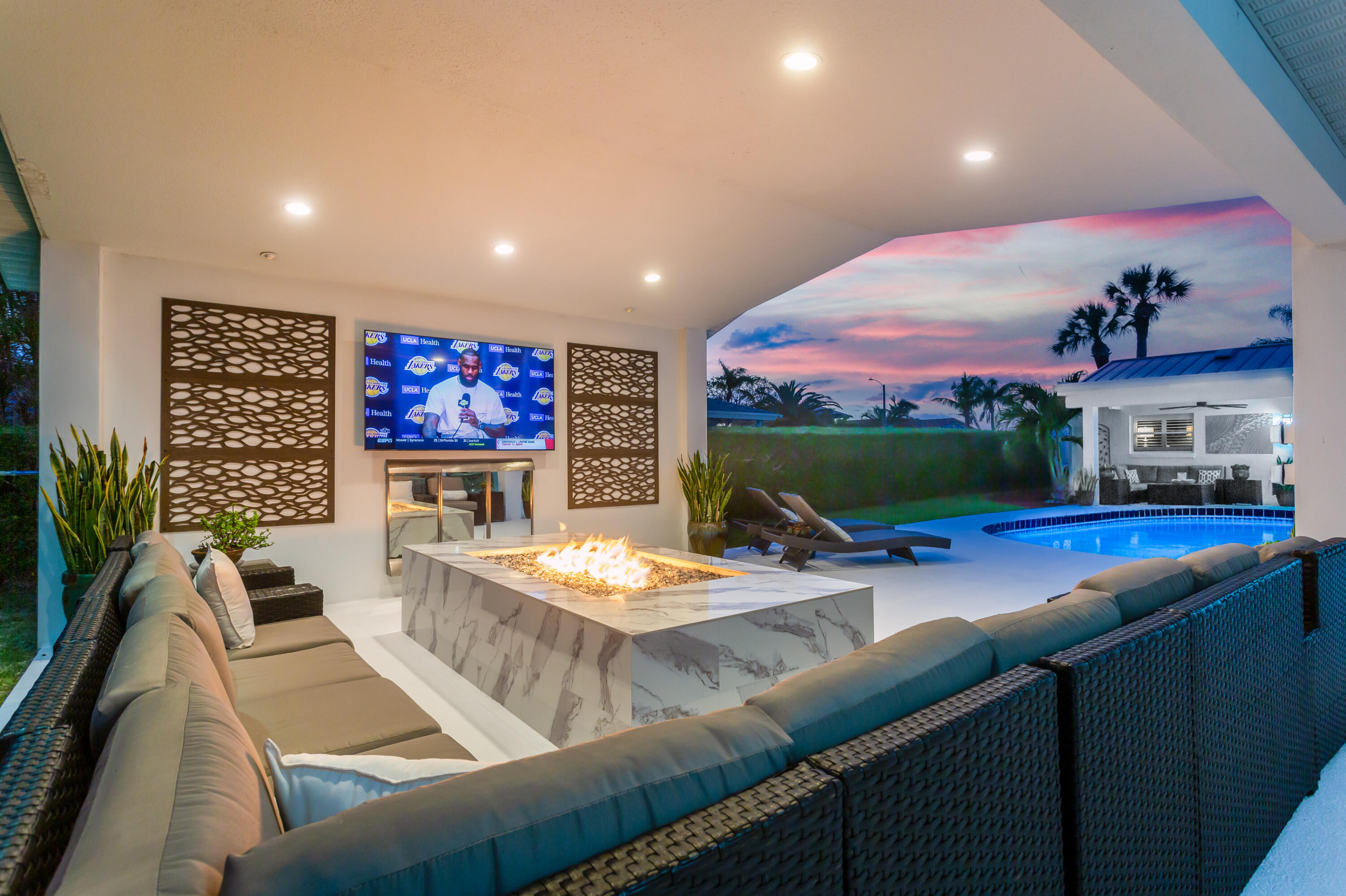 4 Country Club Road Cocoa Beach, FL 32931 - Photo 28 of 38 a living room with furniture and a flat screen tv