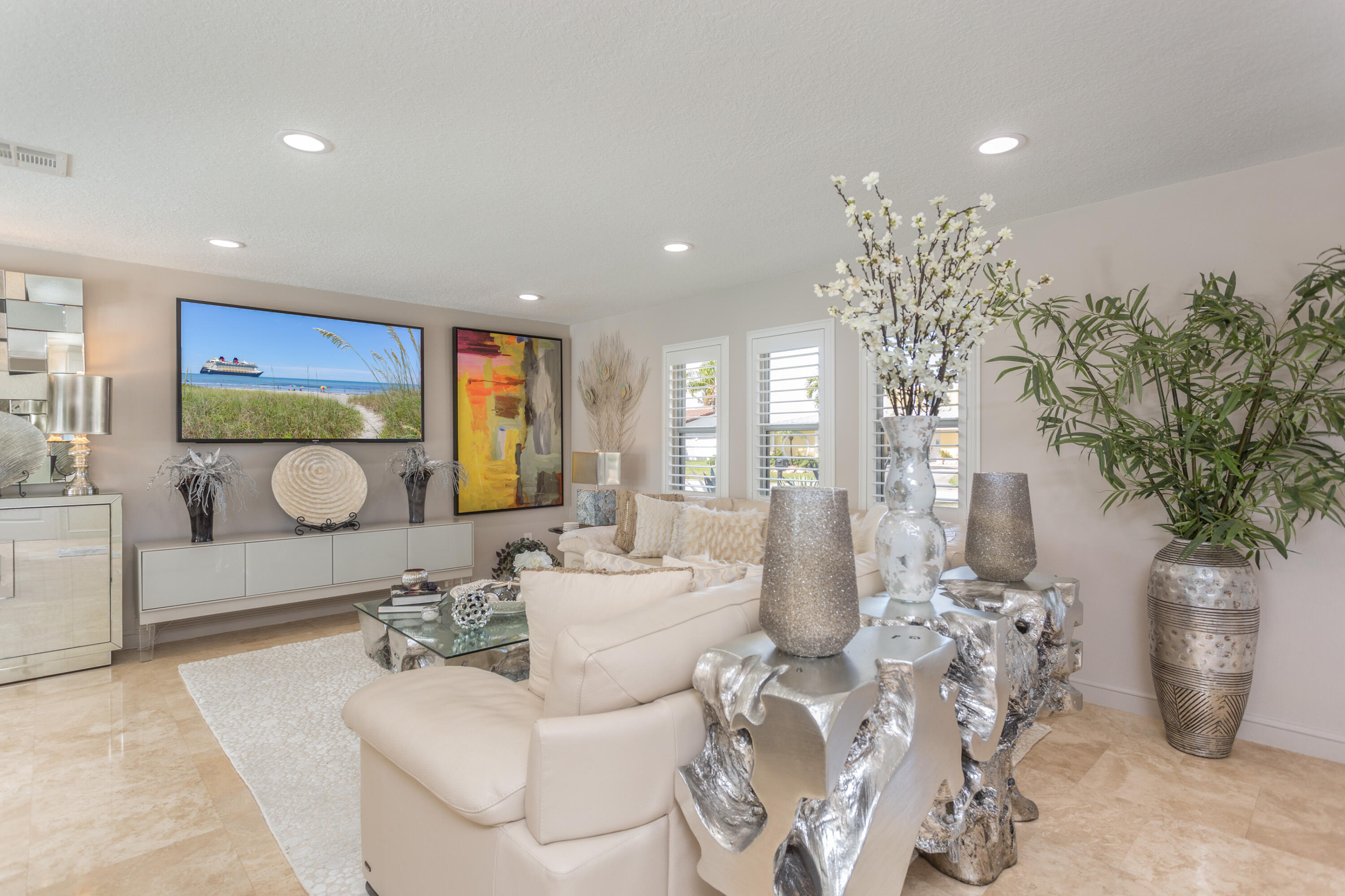 4 Country Club Road Cocoa Beach, FL 32931 - Photo 5 of 38 a living room with furniture and potted plant