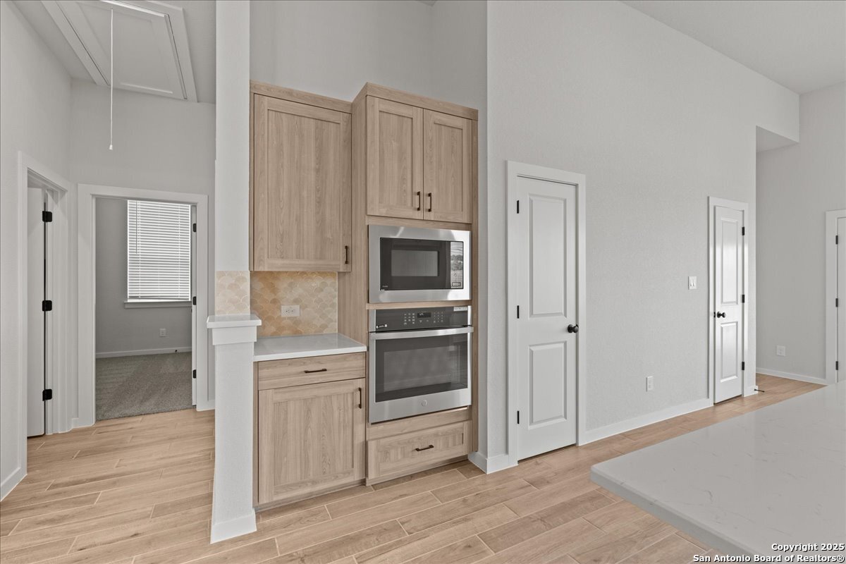 2122 Shepards Street Seguin, TX 78155 - Photo 17 of 28 a view of kitchen space with cabinets and wooden floor