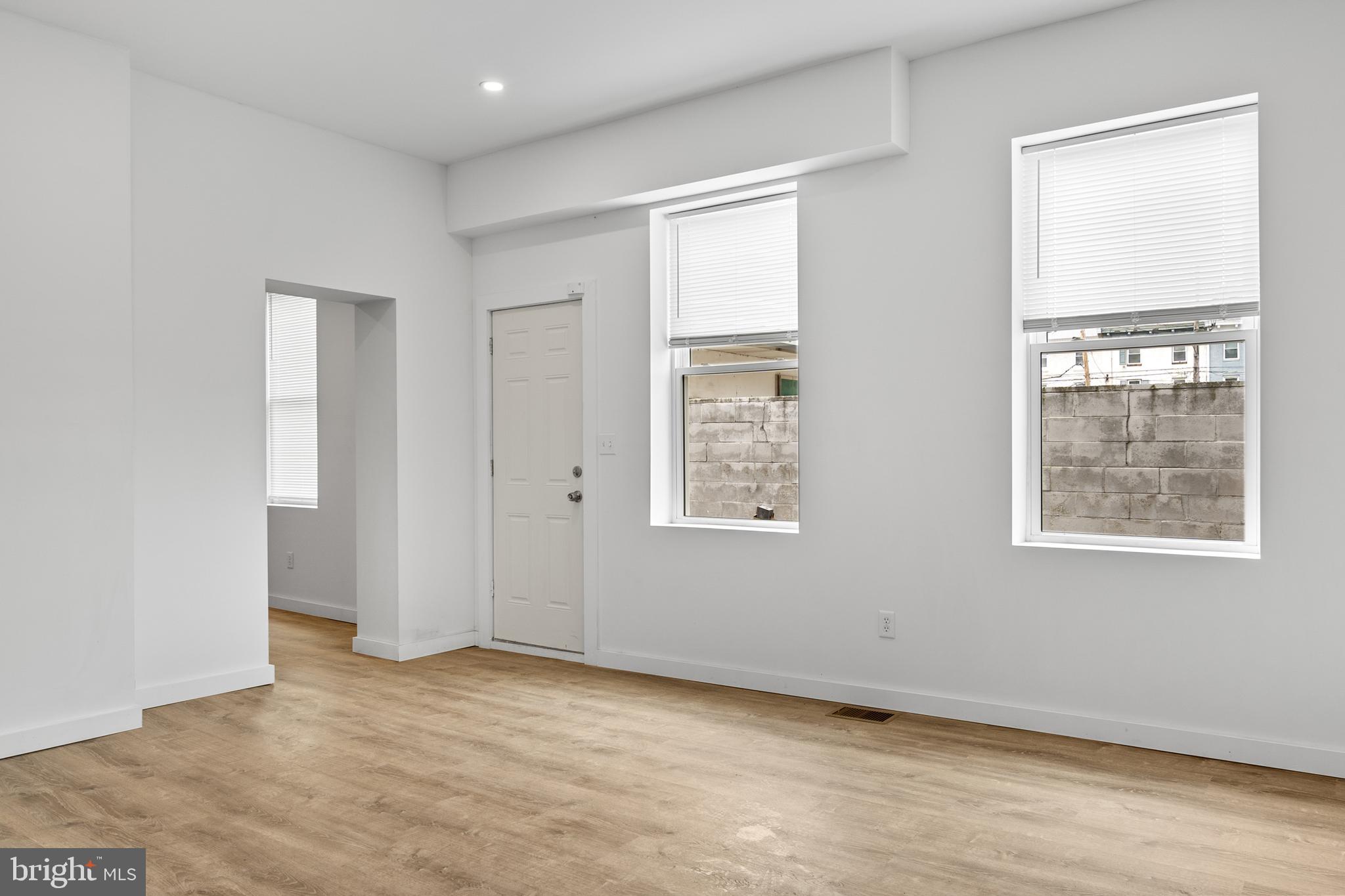 2652 Bridge Street Philadelphia, PA 19137 - Photo 2 of 18 an empty room with windows