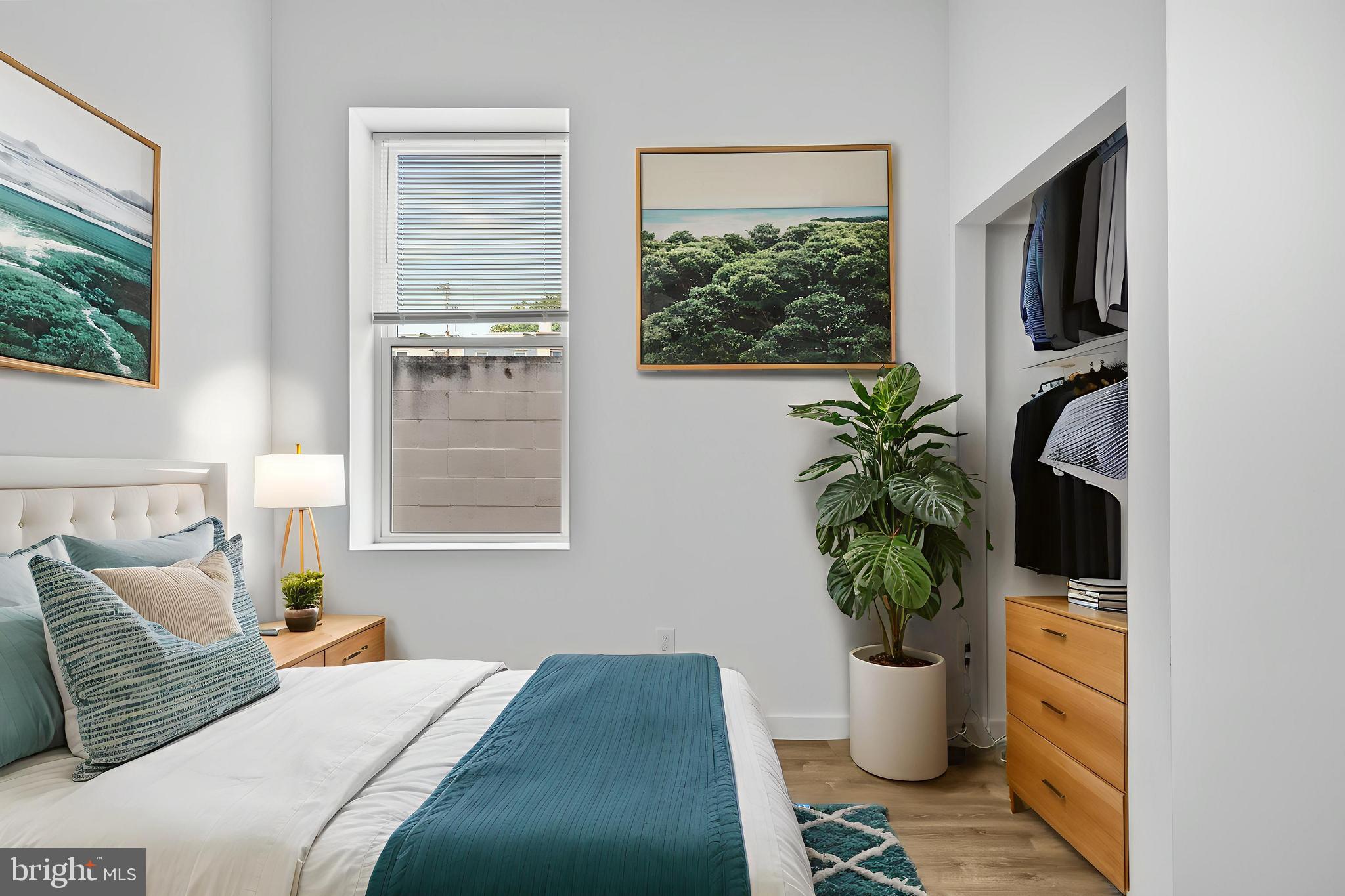 2652 Bridge Street Philadelphia, PA 19137 - Photo 9 of 18 a bed sitting in a bedroom next to a window