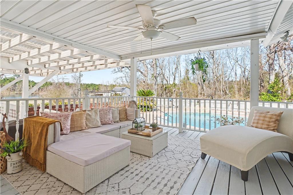 1833 Tom Odum Road Vidalia, GA 30474 - Photo 37 of 59 a balcony with furniture and wooden floor