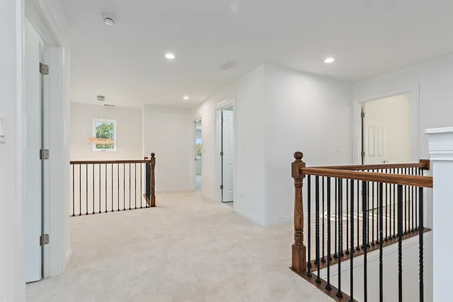 a view of a hallway with entryway