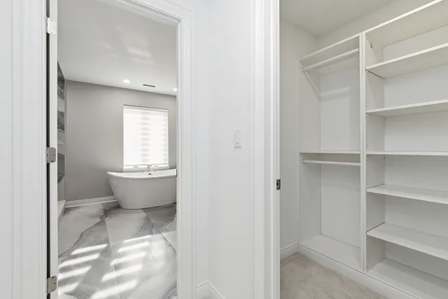 a view of a room with racks on the wall